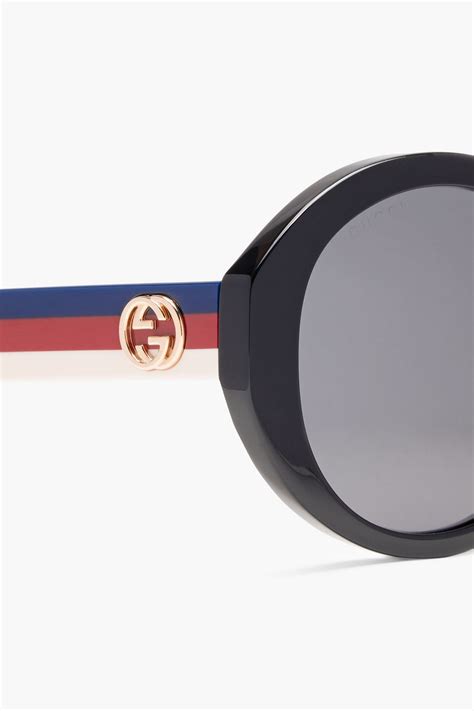 ethans gucci flip sunglasses|Round frame sunglasses in black acetate .